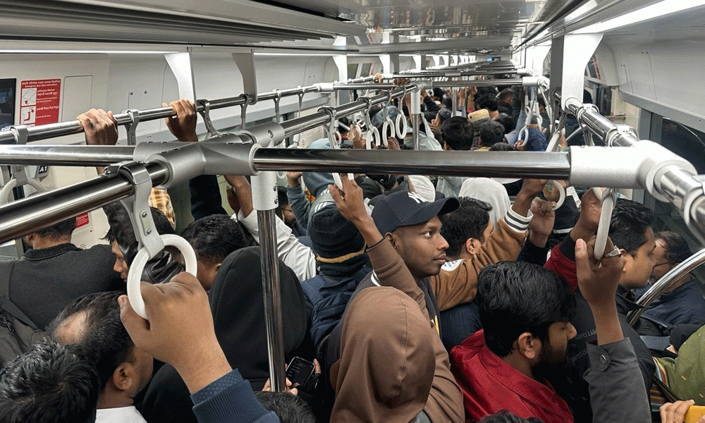 To avoid traffic jam during the rush hours, city dwellers opt to travel by metro rail. Since the metro started operating between Uttara to Motijheel all day, buses have been seeing fewer passengers than previous. The snapshot was taken from Pallabi Station area on Wednesday morning. Photo: Rafiqur Rahman Raqu