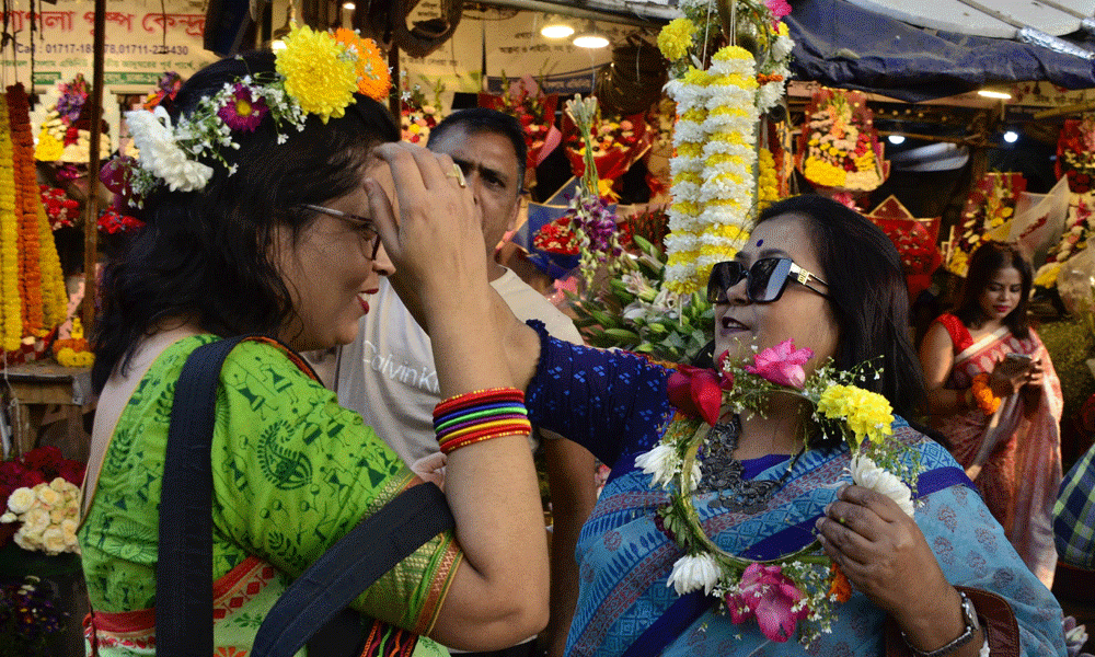 Flower sales marked a sharp rise across the country as many people, especially the teenagers thronged flower shops to buy flowers, floral gifts and boutiques to celebrate the Pahela Falgun and Valentine’s Day. Photo : Muktadir Mokto