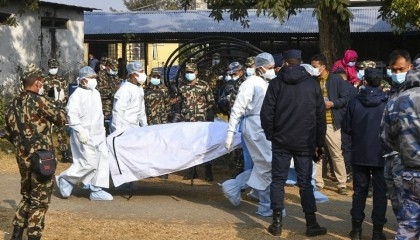Nepali hospitals return bodies from air crash to grieving families
