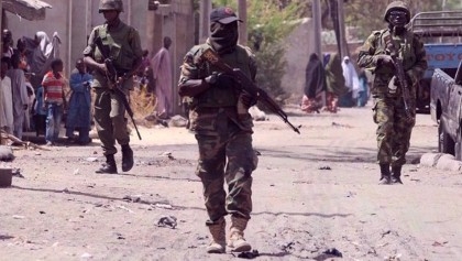 Gunmen kill at least 50 in attacks on village in Nigeria