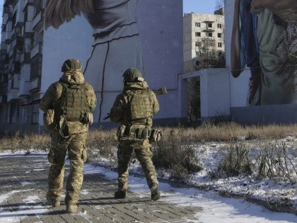 Russia claims Bakhmut surrounded, Kyiv says holding on