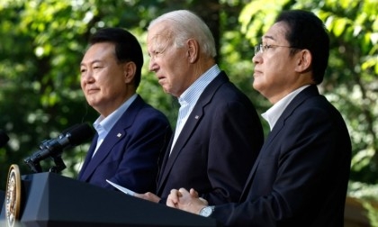Biden salutes 'new era' of united Japan, S.Korea in face of China
