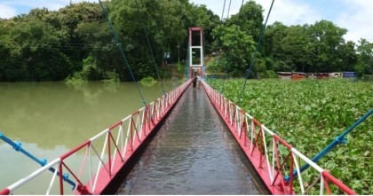 Kaptai hanging bridge goes under water; tourists movement suspended


