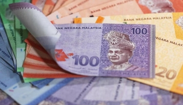 Malaysian ringgit within a whisker of its 1998 record low