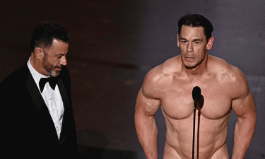 John Cena gives out costume design Oscar in ‘birthday suit’