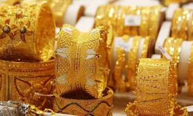 Gold price keeps on falling, drops again by Tk420 per bhori