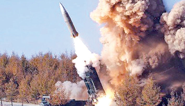 North Korea's Kim oversees 'super-large' rocket launcher drills
