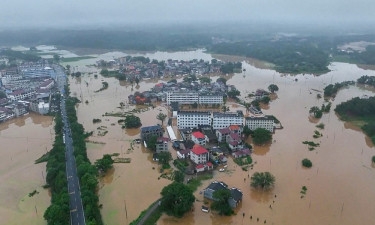 Death toll in south China flooding jumps to 38: State media