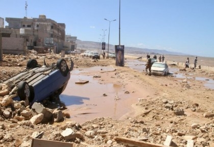 Searchers look for more than 10K missing in flooded Libyan city where death toll eclipsed 11,000

