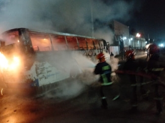 Miscreants set two buses on fire in capital