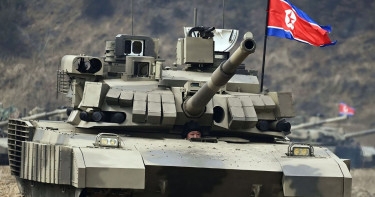 North Korean leader unveils and 'drives' new battle tank